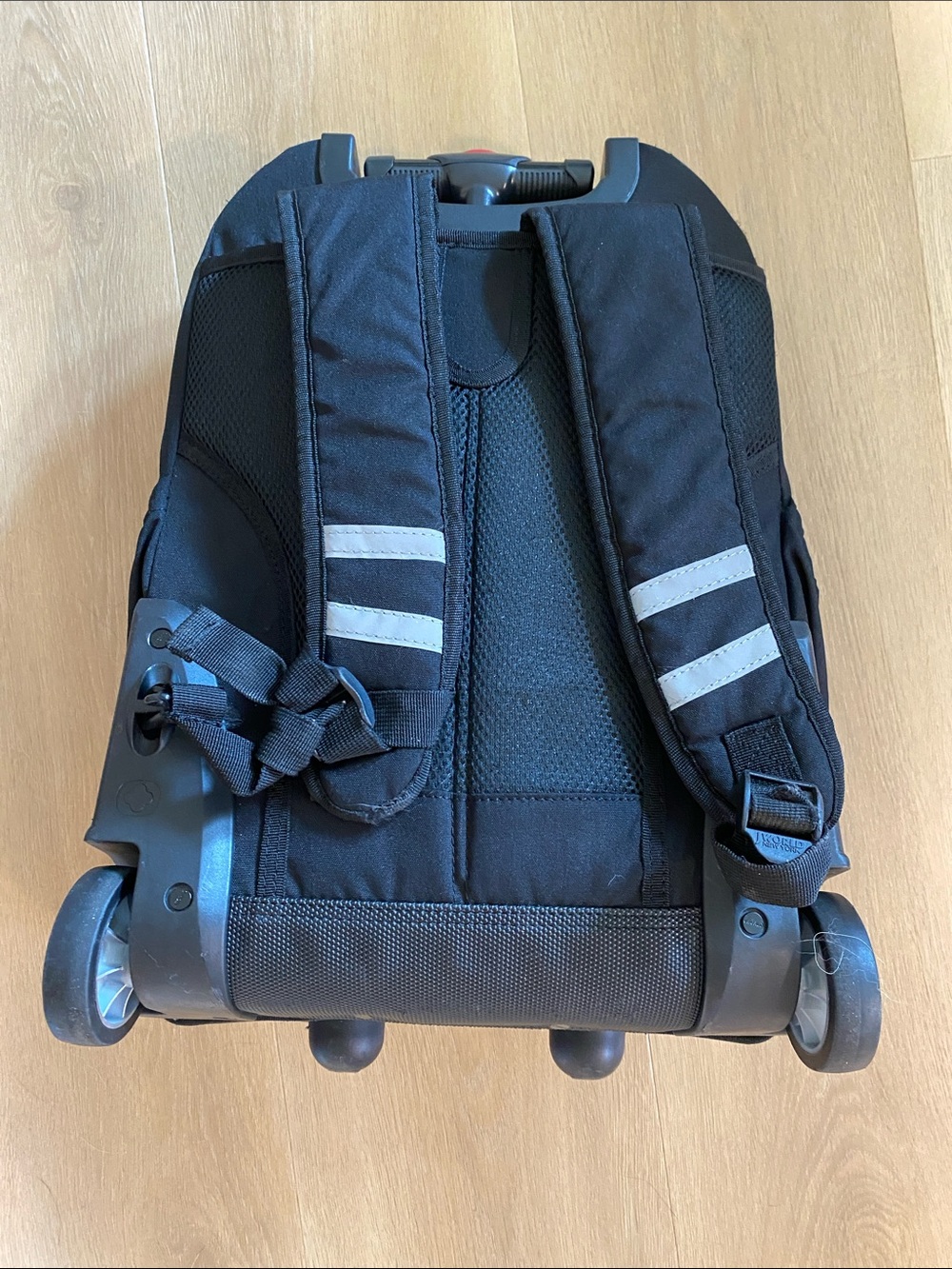 Rolling Black Backpack - Picture 6 of 9